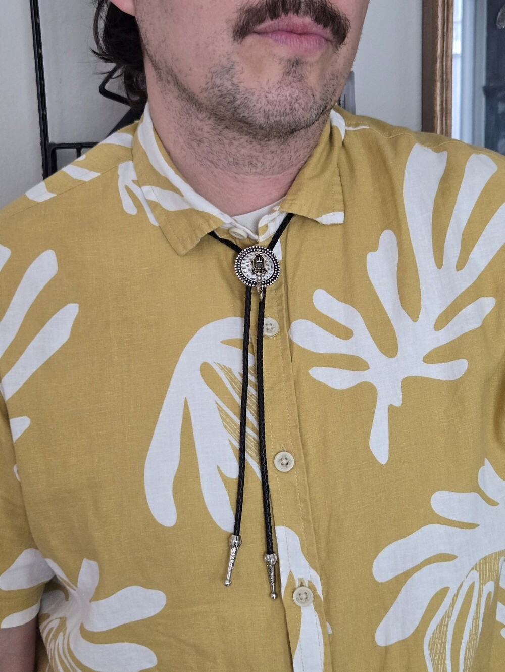 Silver Western Bolo Tie Avon Cuckoo Clock Medallion Leather Braid 70s Eclectic